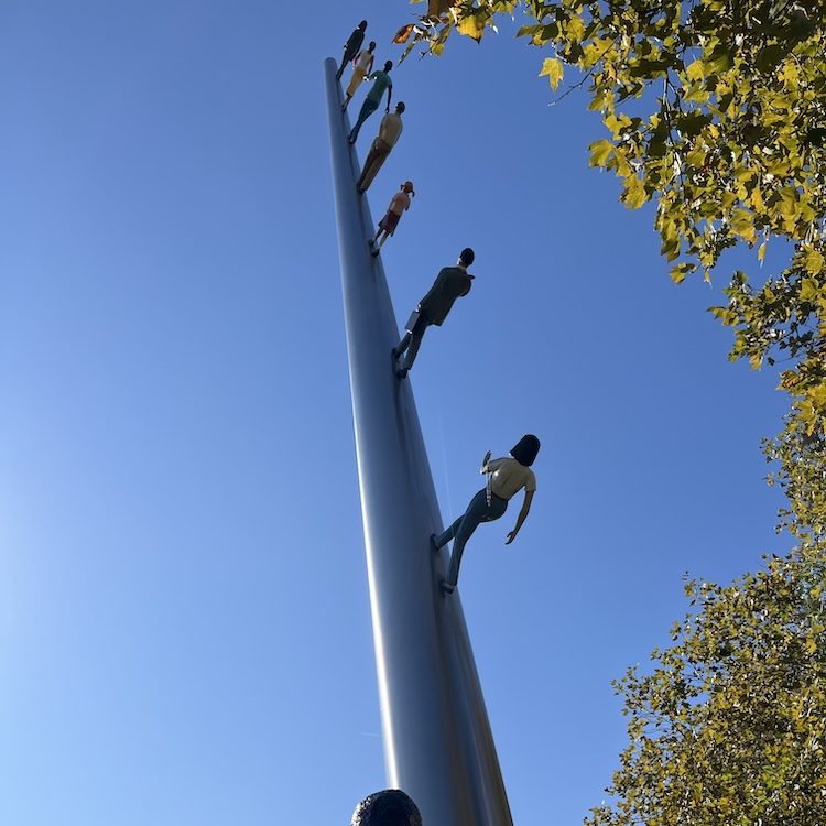 Photo by K. Hott, Walking into the Sky by Jonathan Borofsky, sculpture at Carnegie Mellon University